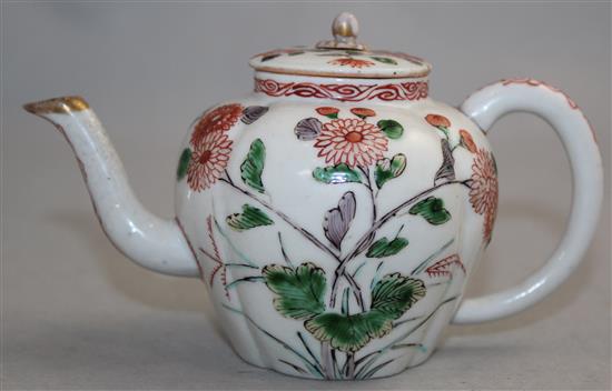 A rare Arita quatre-lobed small teapot and cover, late 17th century, 8.2cm, firing crack to body